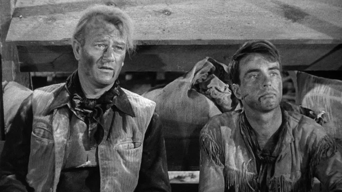 John Wayne e Montgomery Clift nelle battute finali de Il fiume rosso