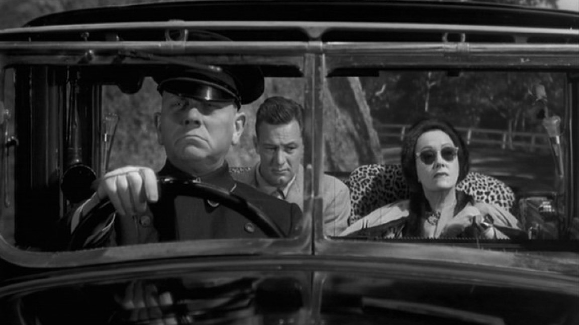 Erich Von Stroheim, William Holden e Gloria Swanson in un momento del film