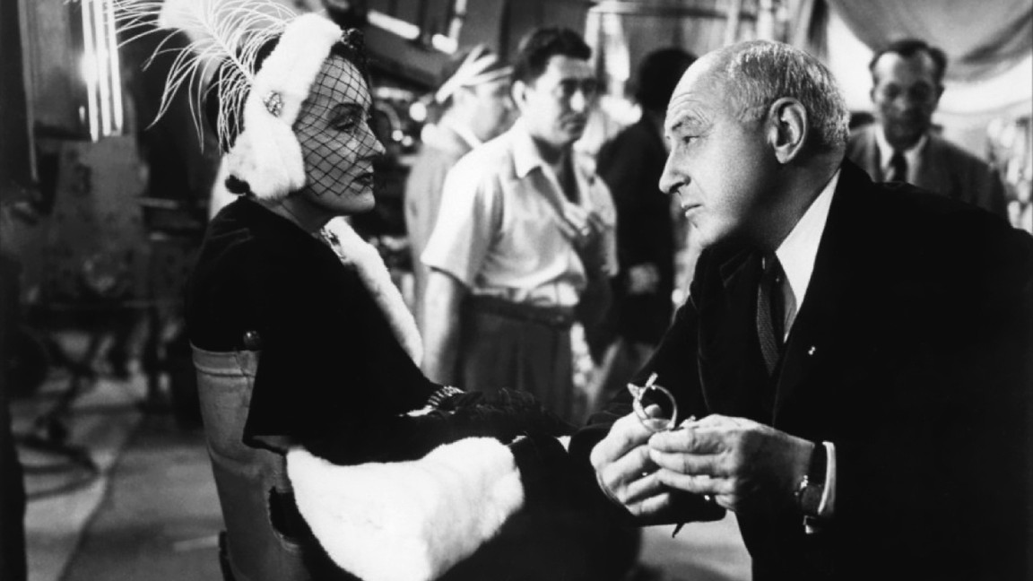 Cecil B. DeMille e Gloria Swanson in un momento di Viale del Tramonto