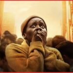 Lupita Nyong'o in un estratto del poster promozionale di A Quiet Place: Giorno Uno di Michael Sarnoski, al cinema dal 26 giugno con Eagle Pictures