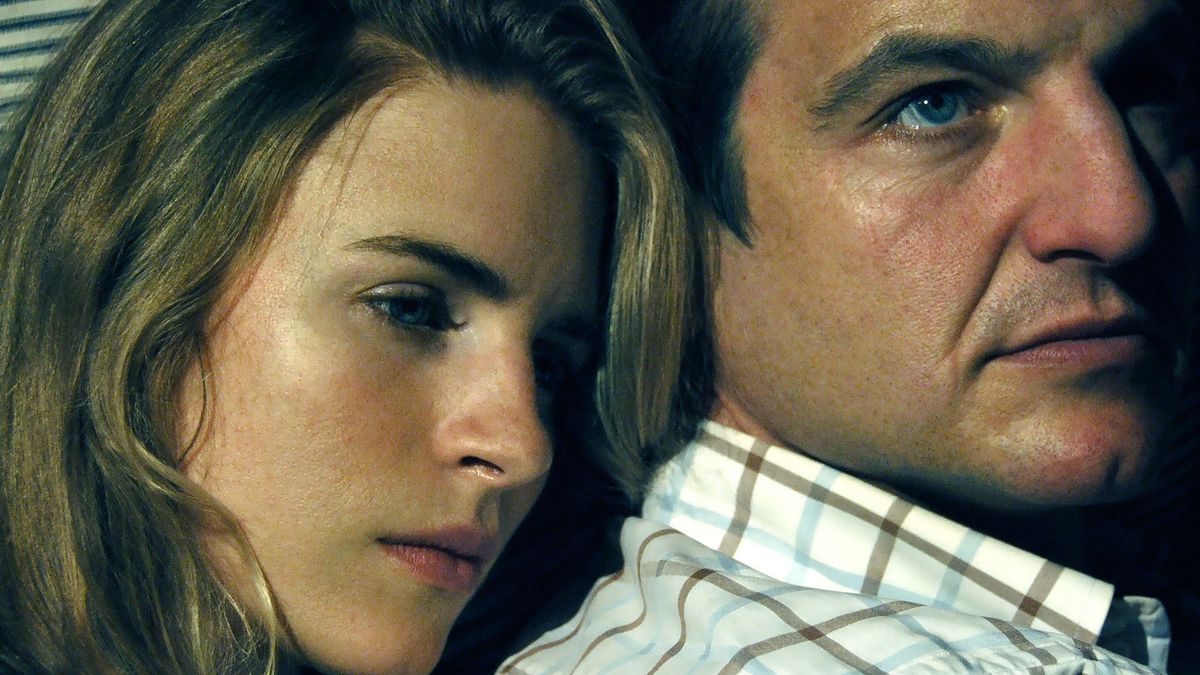 Brit Marling and William Mapother in a scene of the movie